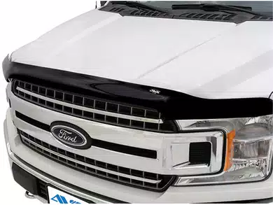 AVS Aeroskin bug deflector installed on a pickup truck hood